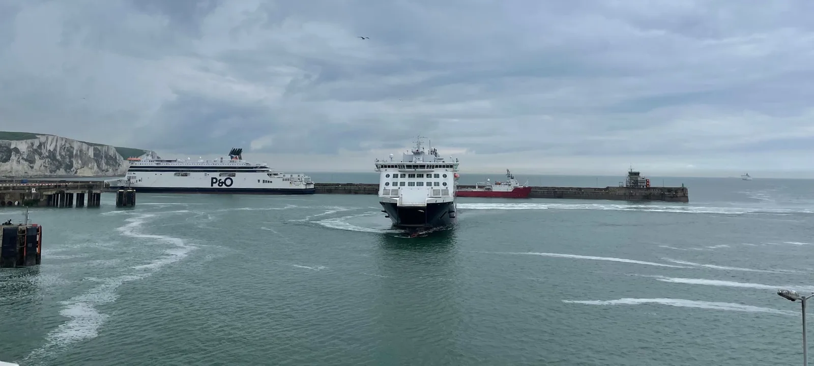 Ferries in Dover harbour beneath the White Cliffs