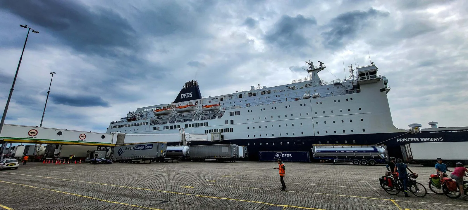 The DFDS Princess Seaways at the IJmuiden terminal, with cyclists waiting to board