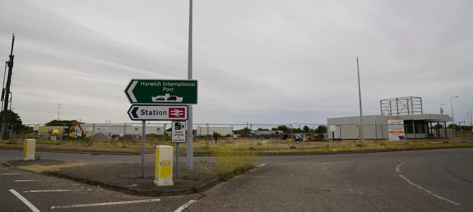 Road signs for Harwich International Port and the station, where the boat train meets the ferry