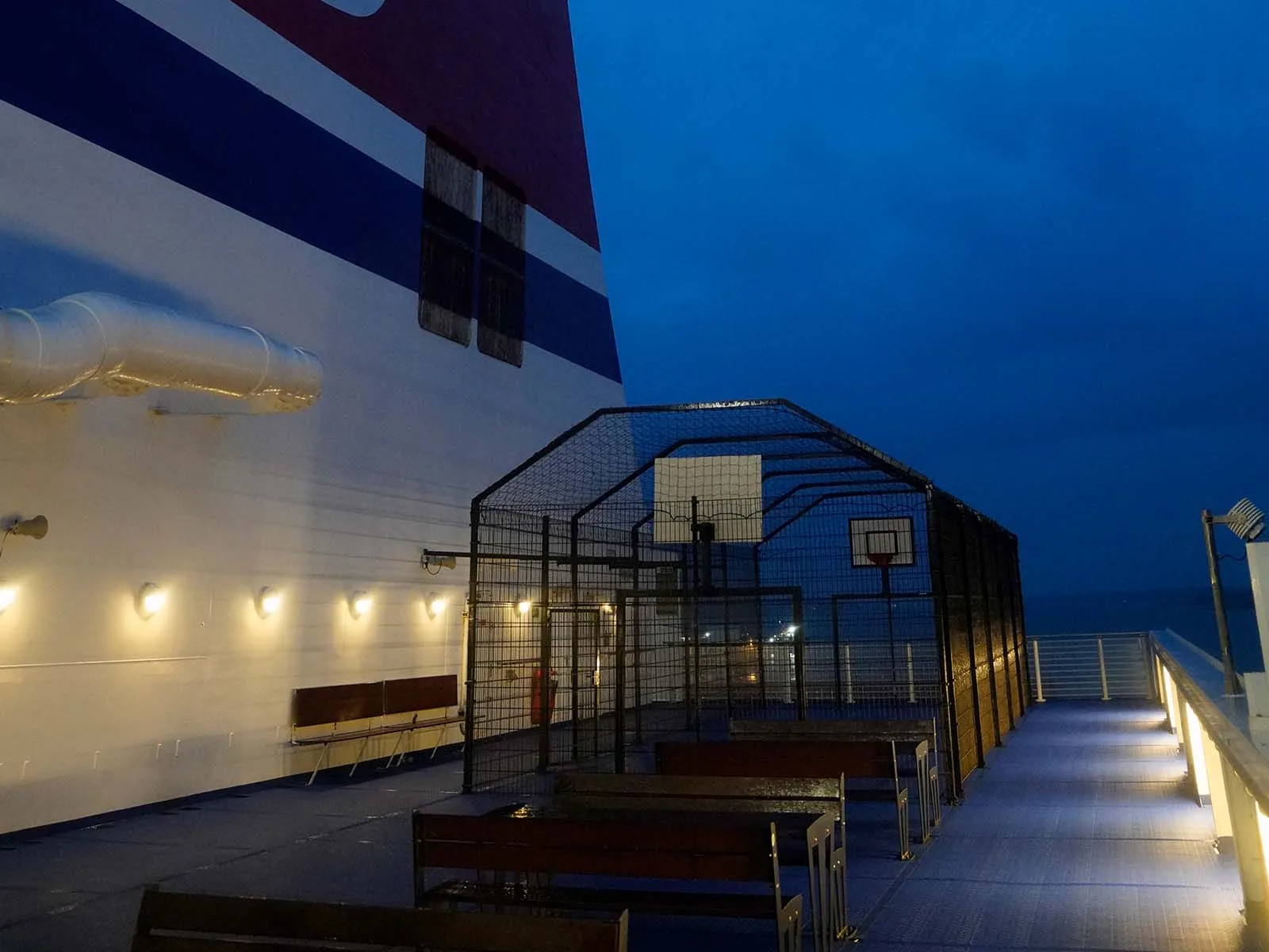 The aft deck at dusk, sports cage included