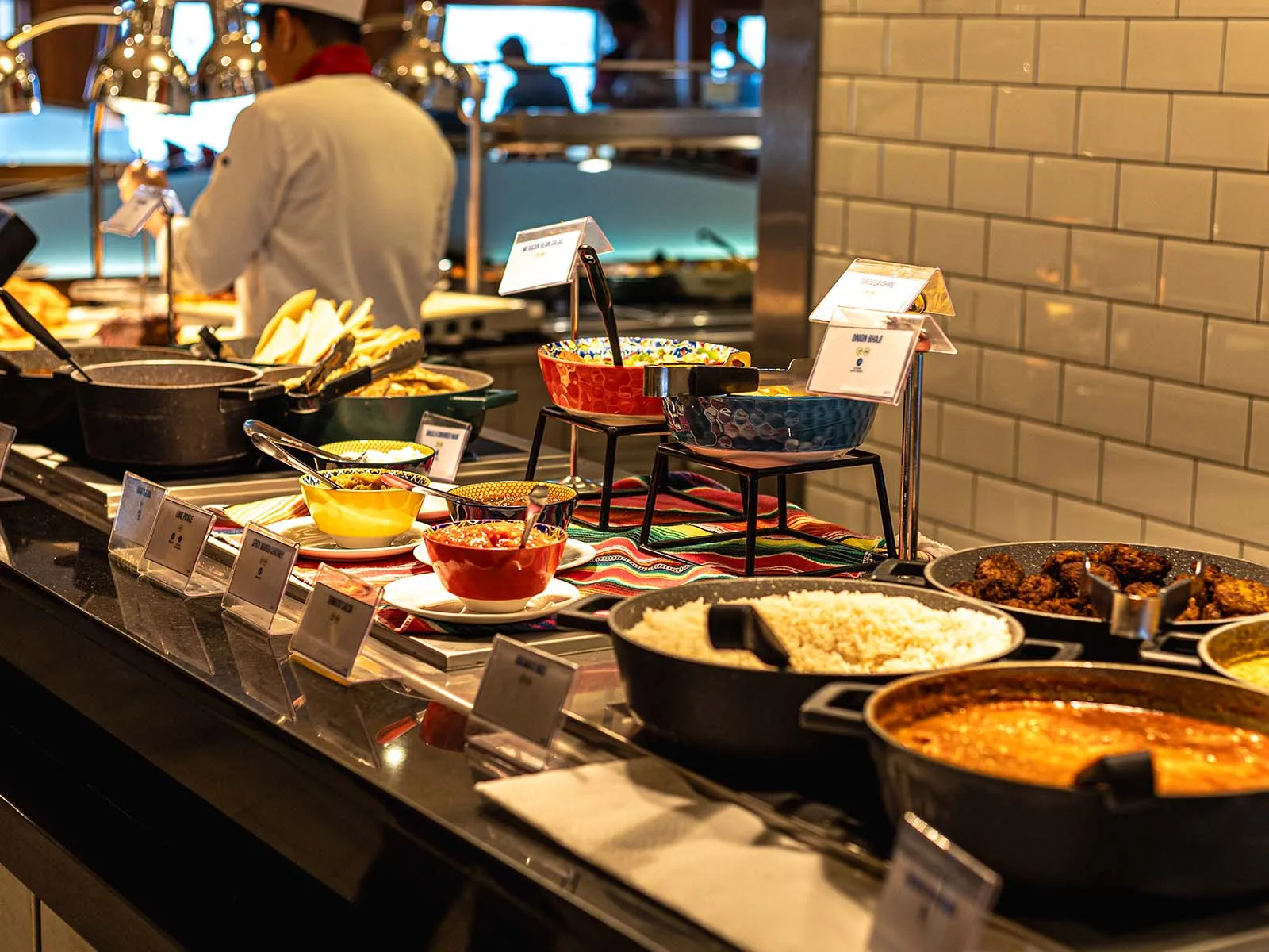 The Kitchen buffet: curries, rice and the chef at work